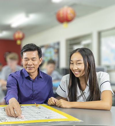 Son teaching Mandarin at CSHS with student in 2019.