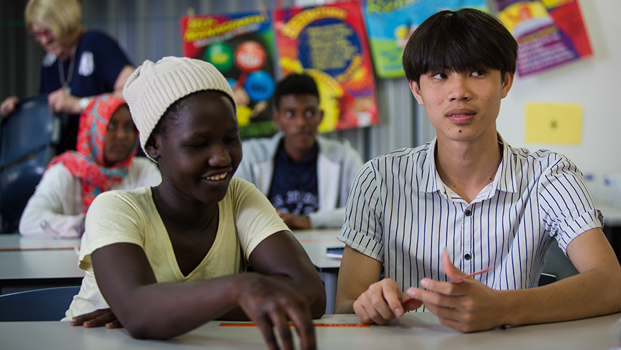 Two students sitting in the classroom