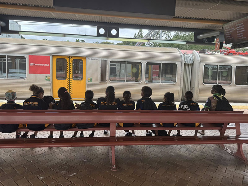 Students at a train station